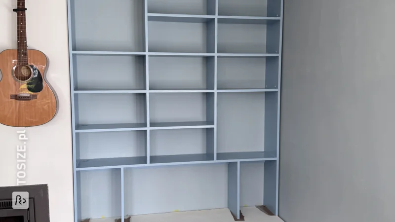 Make your own blue bookcase with base cabinet for the living room, by Jaap