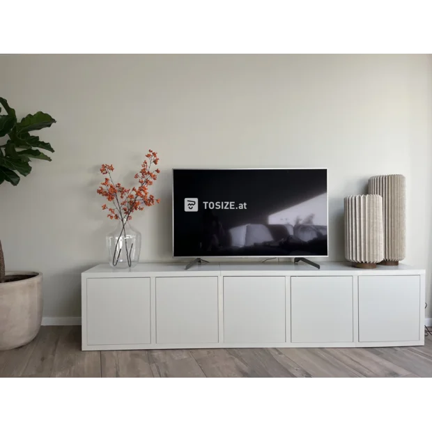 White sideboard with doors and open compartments