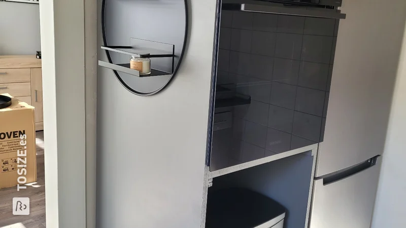 Hazlo tú mismo con un elegante mueble de horno gris, de Eric