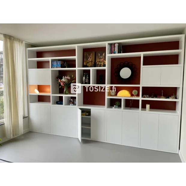 White cupboard wall with open compartments and doors