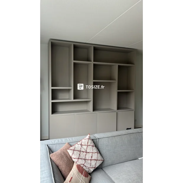 Gray cabinet with open compartments and doors