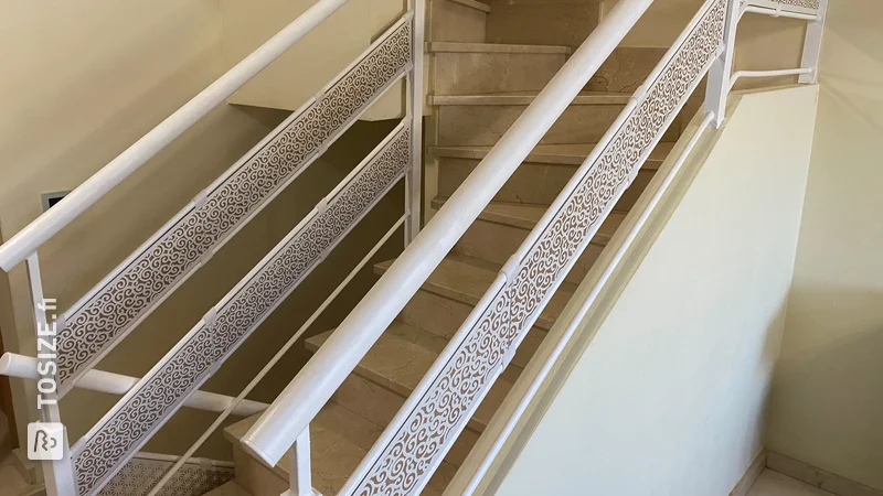 Railing decoration using white lacquered MDF panels with carvings of different textures