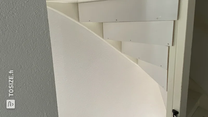 Close open stairs with plywood, by Michel