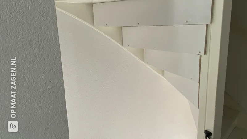 Close open stairs with plywood, by Michel