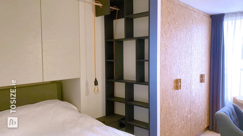 Design bookcase with integrated bedside table, by Eric