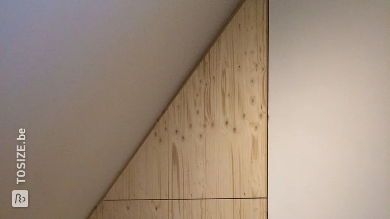 Attic doors in a slanted space, by Arno