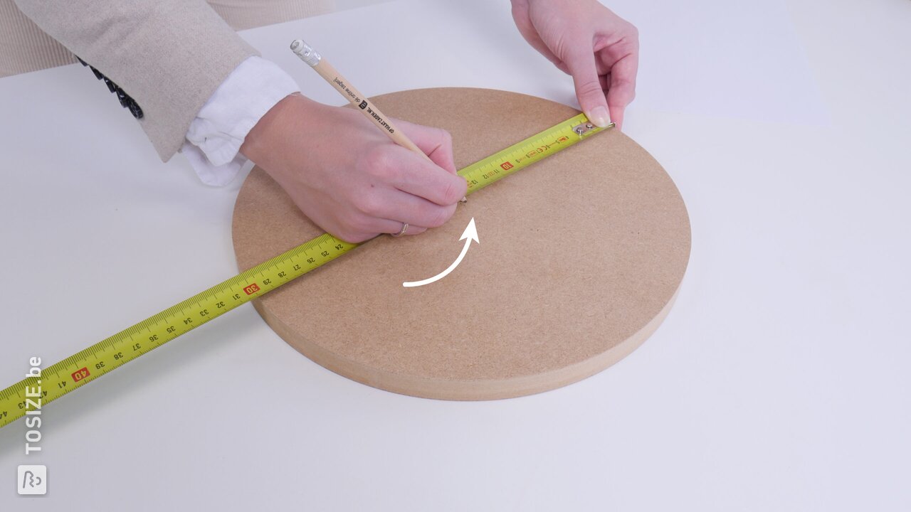 Hoe vind je het midden of middelpunt van een cirkel of ronde vorm? Wij