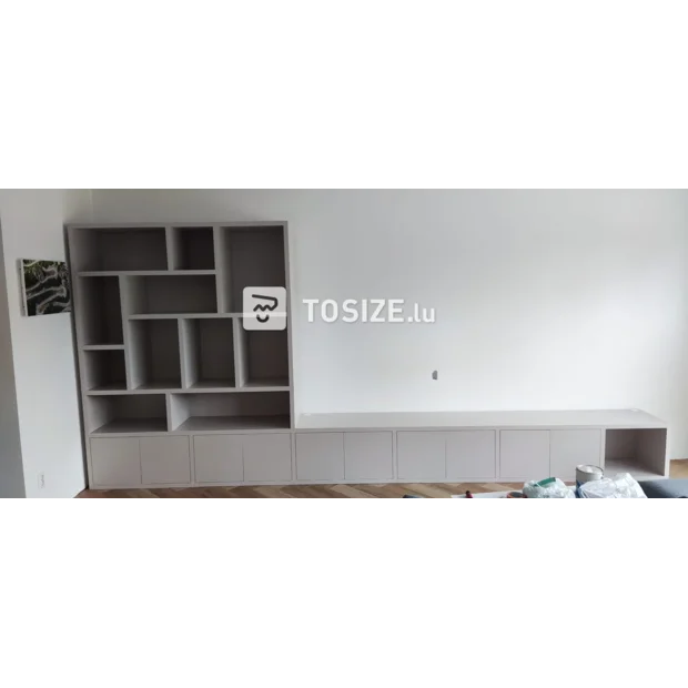 White cupboard wall with open compartments and doors